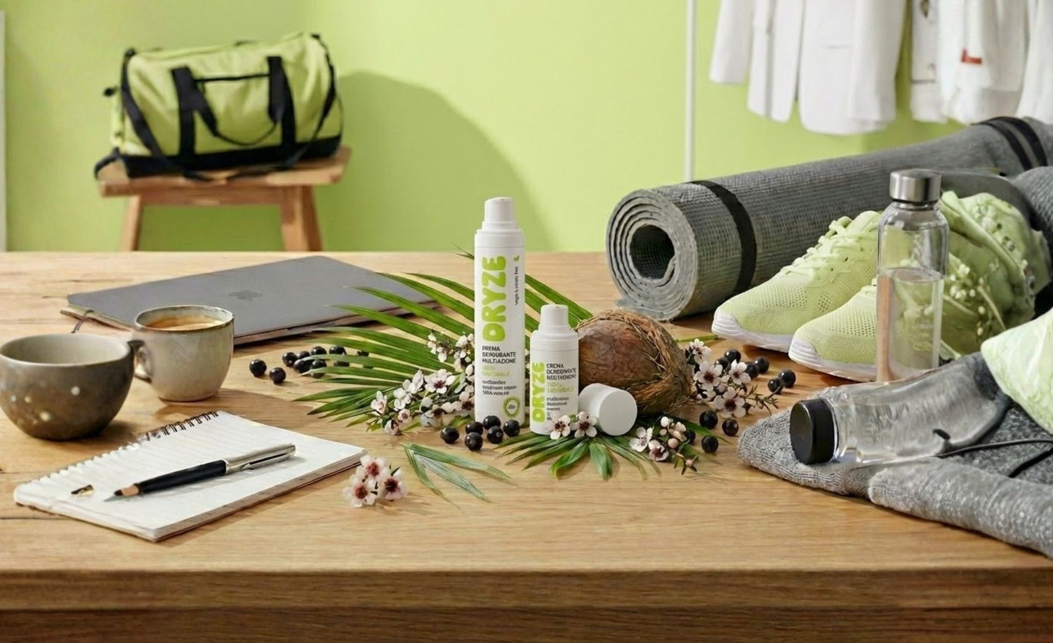 Kit deodorante Dryze su scrivania con laptop e attrezzatura da palestra, ideale per ufficio e sport.